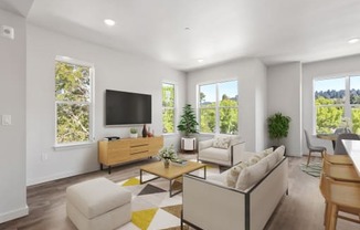 a living room with white walls and a yellow and white rug (Hawthorne Building)