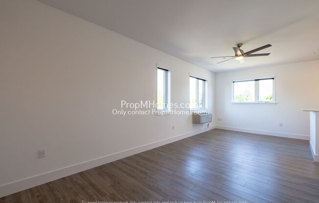 Updated Two Story Unit in SE – Quartz Counters + A/C!