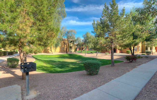 Mailbox on gravel path at San Bellino Apartments, Glendale, Arizona