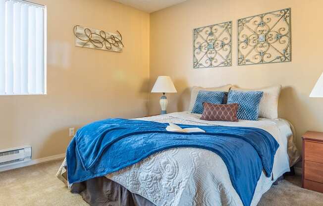 Rio Vista spacious bedroom with natural lighting and carpet flooring 