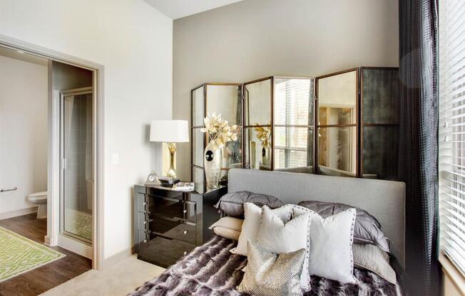 bedroom with adjacent bathroom