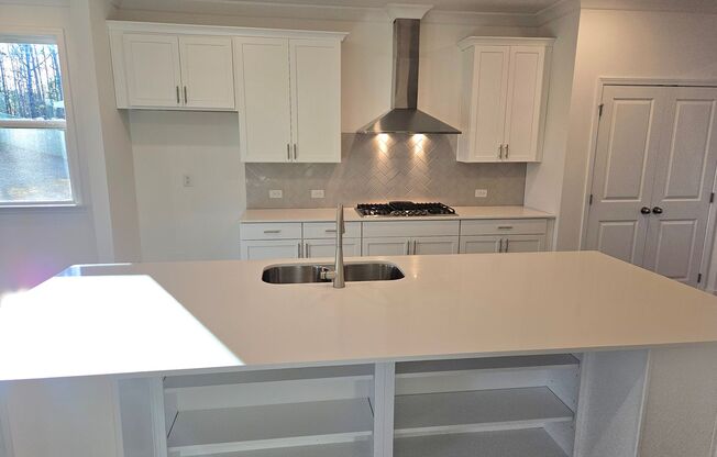 Incredible Farmhouse Style Home with Three Car Garage