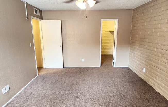 1x1 Brown Upgrade Main Bedroom with Closet at Mission Palms Apartment Homes in Tucson AZ