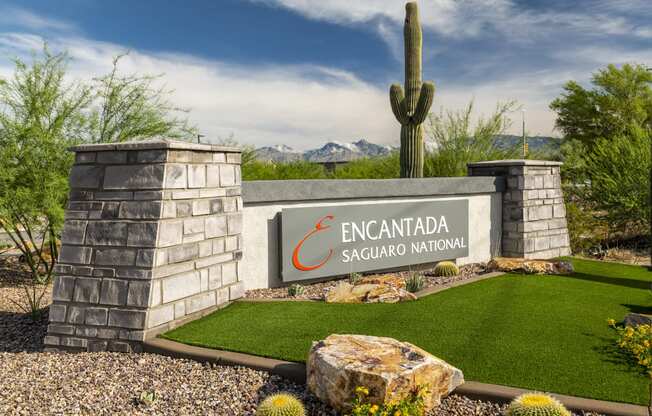 a view of the sign at the entrance to the encantada saguaro national
