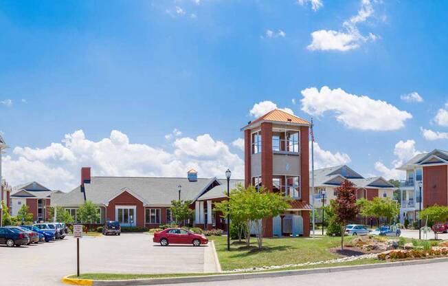 main entrance to 1200 Acqua Apartment Homes in Petersburg, VA