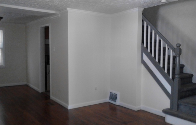 Cozy 2 Bedroom Semi-Attached Home on Quiet Cul-de-Sac! Recently Updated and Freshly Painted! Hardwood Floors!
