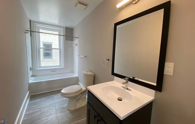 2 beds, 2 baths, 933 sqft, $2,015, Unit 703