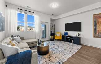 a living room with a couch and a tv