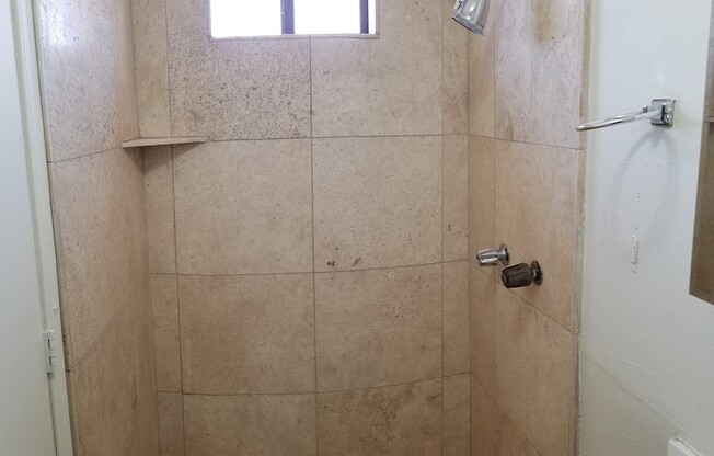 COZY AND AFFORDABLE UNIT ACROSS FROM CELEBRITY THEATER