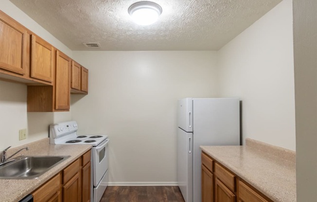 This is a photo of the kitchen in the 938 square foot , 2 bedroom, 2 bath apartment at Blue Grass Manor Apartments in Erlanger, KY.