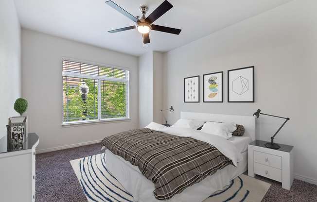 Model master bedroom with ceiling fan