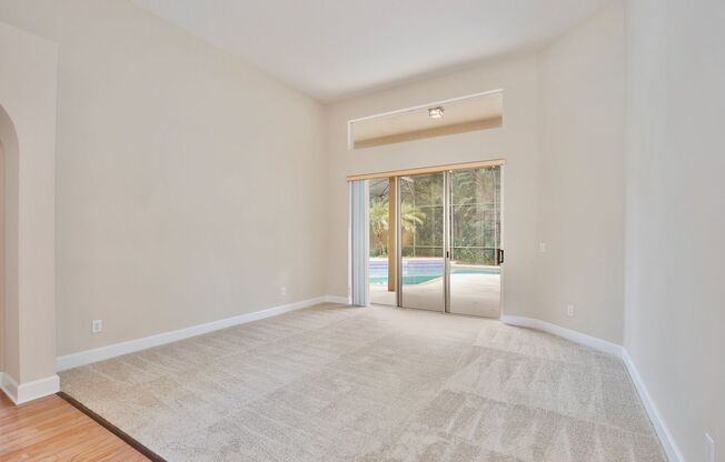 Stunning 4/3 Pool Home with a Bonus Room and a 2 Car Garage in the Desirable Cambridge Crossing - Winter Garden!