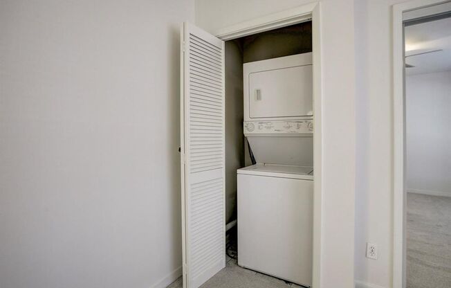 Beautifully remodeled two-story condo in a gated, centrally located community.