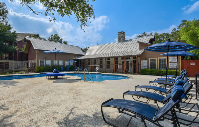 our apartments have a large pool and lounge chairs