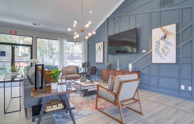 Resident clubhouse at Mirador at Idlewood in Clarkston, Georgia, offering stylish lounge seating, social spaces, and community amenities.