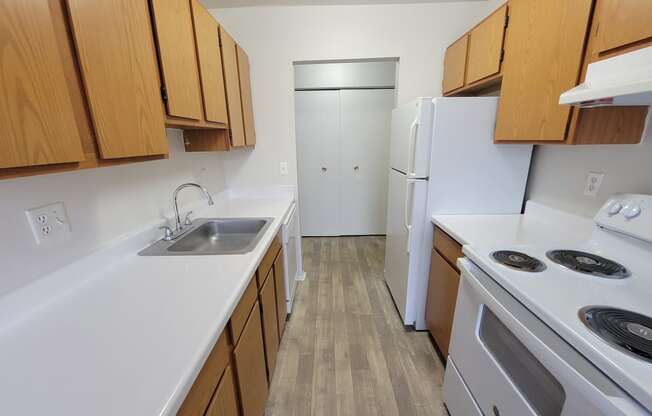 fully equipped kitchen with appliances at Garfield Commons Apts in Clinton Township, MI