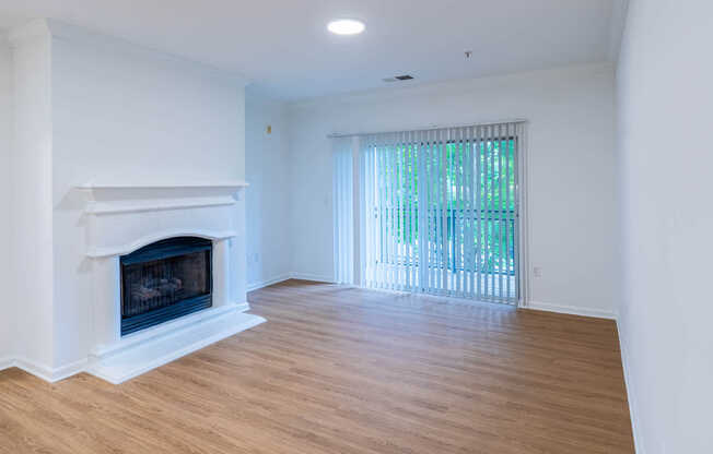 Living Room with Fireplace and Balcony