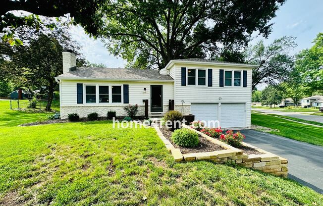 Beautiful Overland Park Home w/ Wood Floors, SS Appliances, Finished Basement and a Fenced Yard! (LAWN CARE INCLUDED!!)