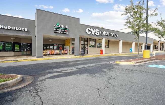 A CVS Pharmacy is located in a strip mall with a Burger King and H&R Block.