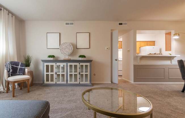 This is a photo of the living room in the 822 square foot, 2 bedroom, 1 bath floor plan at Village East Apartments in Franklin, OH.