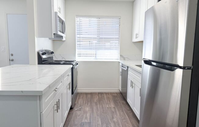 Winter Gardens | 1 & 2 Bedroom Apartments with Parking and Sparkling Pool!