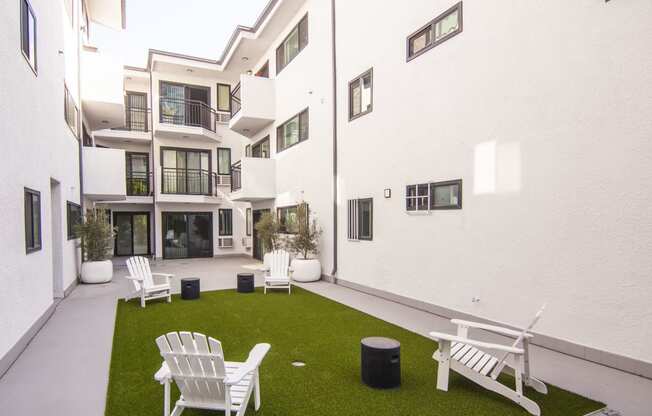 Center courtyard with outdoor seating area at Westwood Riviera Apartments, California