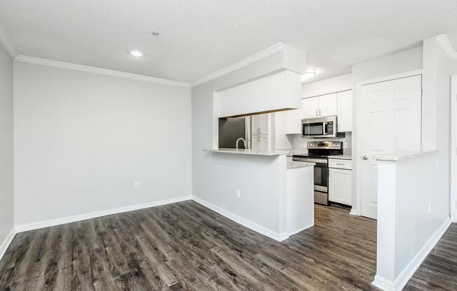 a kitchen with a wooden floor