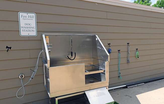 A dog washing station is available at Fox Hill Apartments.