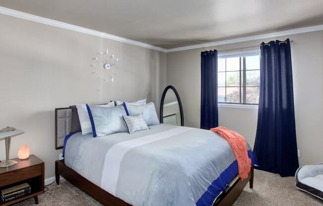 the view of a bedroom with a bed and a window at 2000 Lake Washington Apartments, Renton, 98056