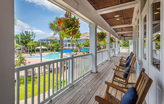 Windward Long Point Apartments - Deck overlooking saltwater pool