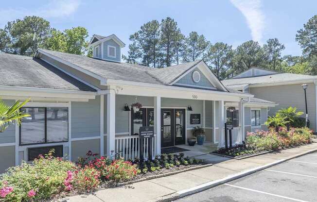 A building with a porch and a sign that reads 500.