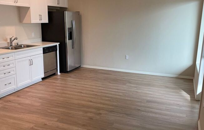 1 bed, 1 bath, 717 sqft, $2,395, Unit 210