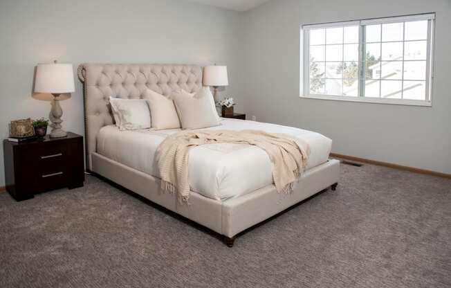 Master bedroom with vaulted ceiling