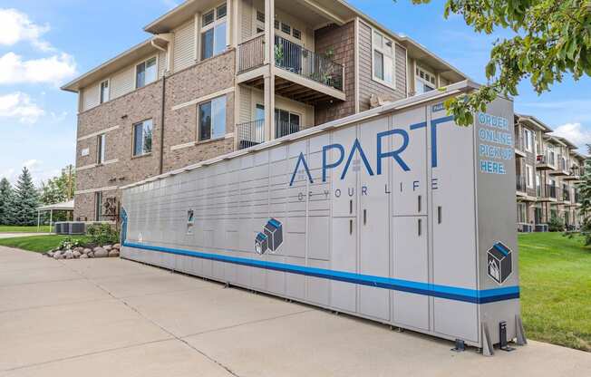 Apartment building with a sign that says "Apartment of your life".
