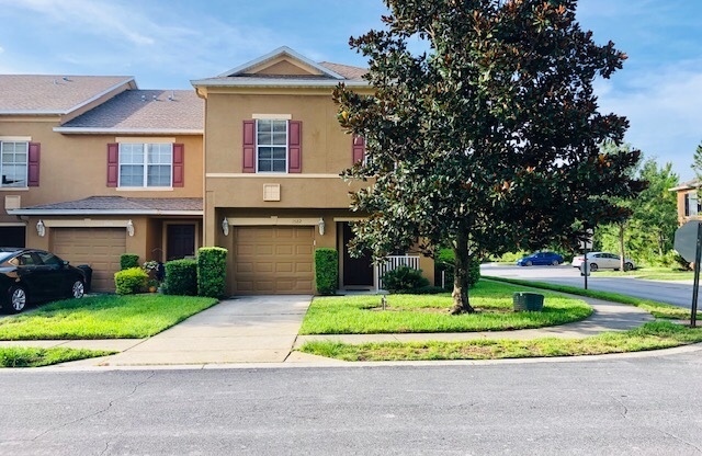 MOVE IN JULY- Wonderful 3 bd 2.5 ba corner unit townhome! NO CARPET! Tile on 1st floor/stairs & 2nd floor wood laminate