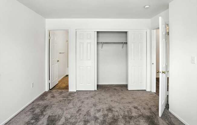 Bedroom With Closet at Oakstone Apartments, Clearfield, Utah