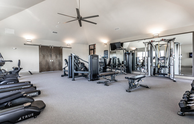 furnished fitness center with equipment