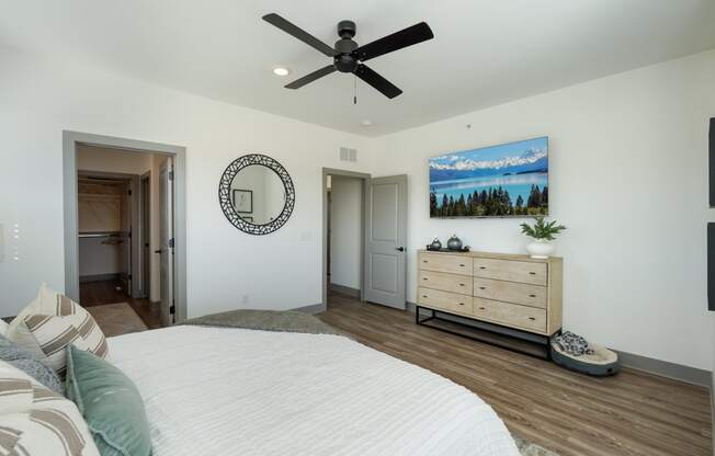 a bedroom with a bed and a ceiling fan at Meridian at CityPlace, Woodbury, Minnesota 55125