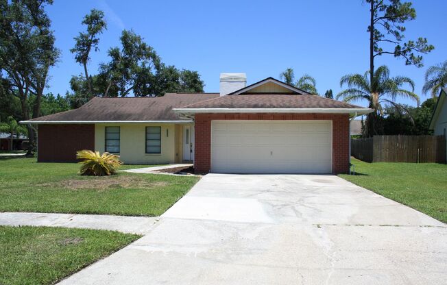 Enjoy Peaceful Living in this Northdale Corner Lot Single Family Home