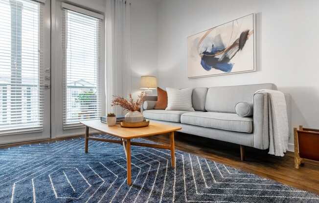 a living room with a couch and a coffee table