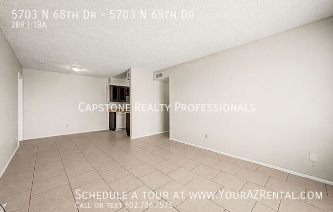 5703 N 68 DR