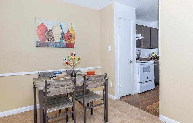 a kitchen with a sink and a refrigerator