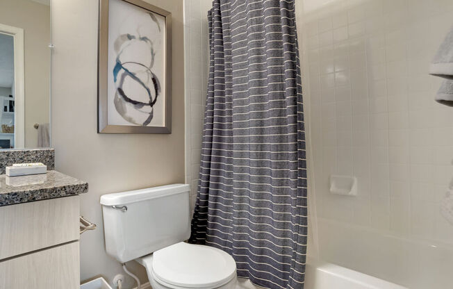 Renovated bathroom with updated vanity and shower at Elme Germantown, Maryland