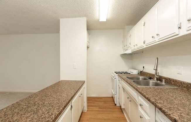 Kitchen with White Appliances and White Cabinets