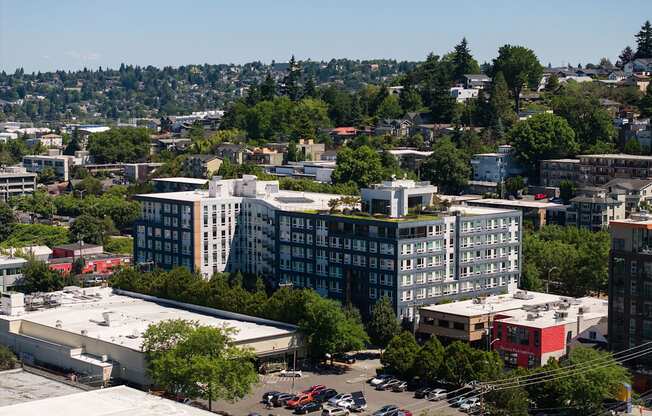 A cityscape with buildings and cars.