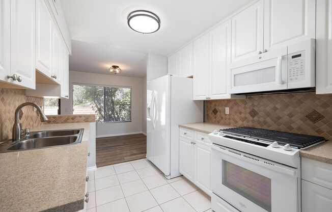Price Reduced to $2,995 - Gorgeous updated 2 - level pristine townhome in Poway