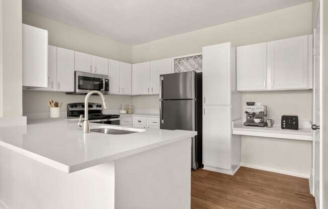 the preserve at ballantyne commons apartment kitchen with stainless steel appliances