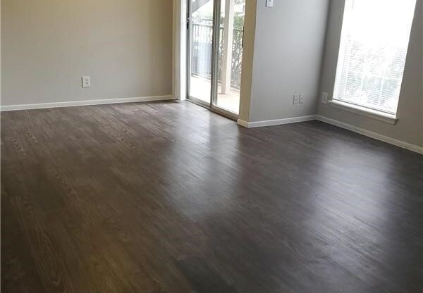 dark hard wood flooring for our living room
