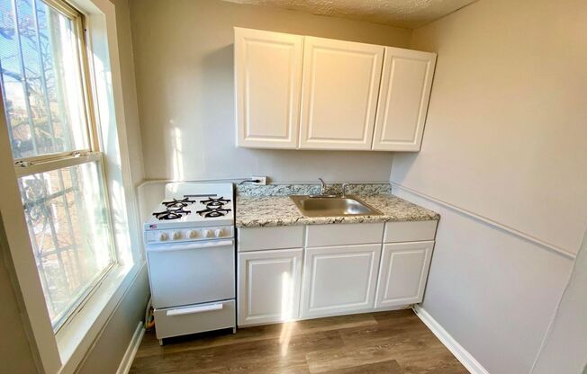 For Rent: Classic Elegance at 2504 N Calvert St – Your Timeless Urban Retreat!