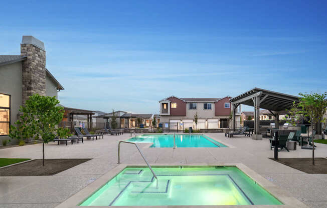 A swimming pool with a greenish hue in the middle of a residential area.